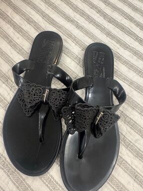 Salvatore Ferragamo Black Crochet Bow Thong Sandals with Logo Accent